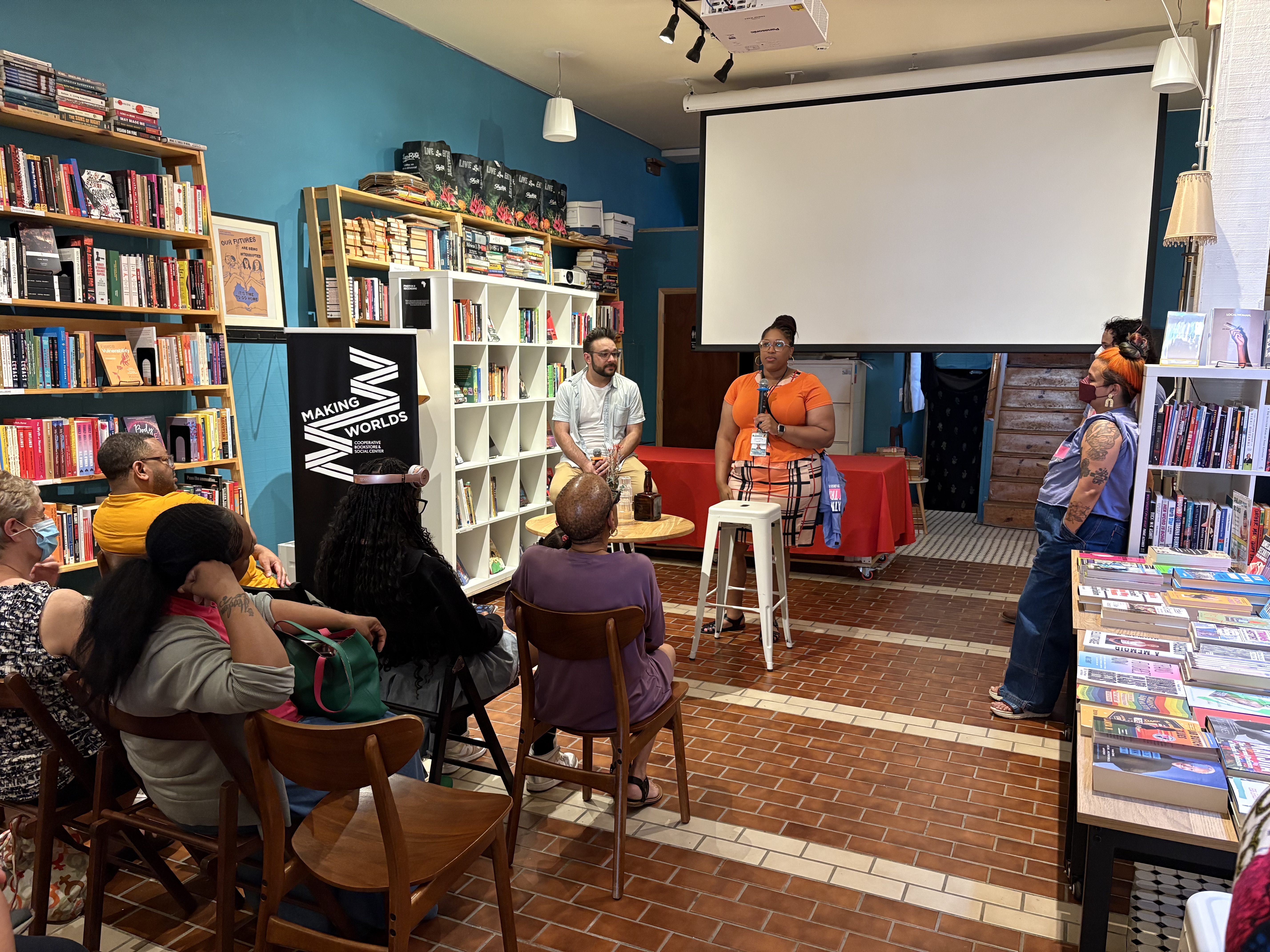 Ben and Deshante speak to community members