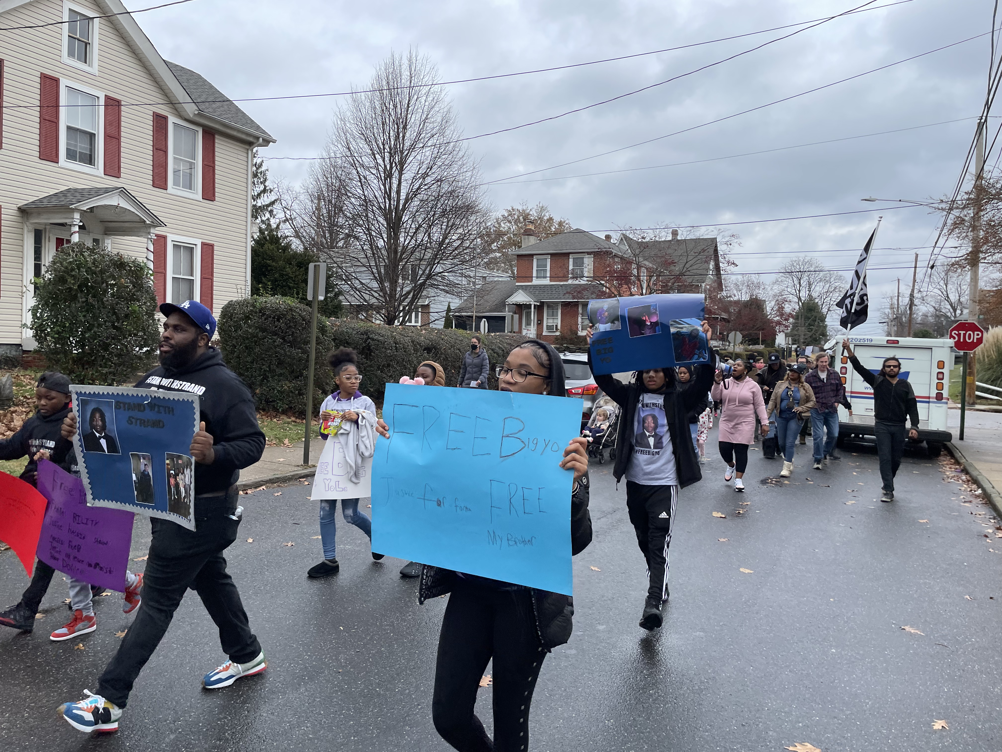 Family members and friends of Hasein Strand lead a march demanding justice for Fanta Bility, AJ Ford and Hasein Strand