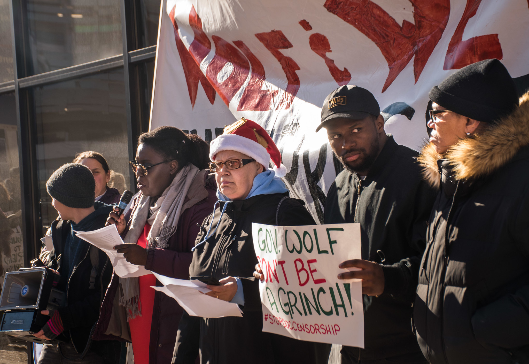 Nikki Grant speaks at a rally against Department of Corrections censorship