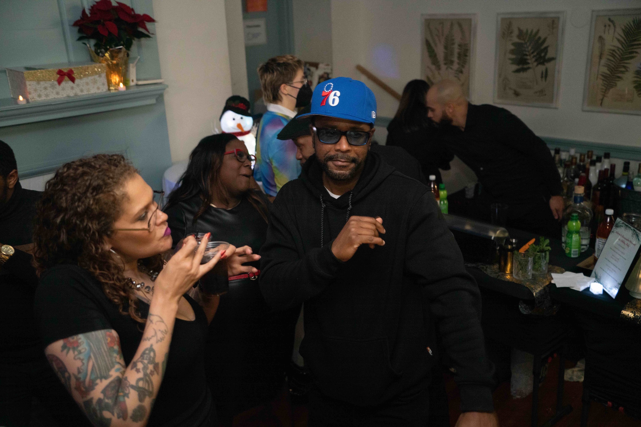 Shakaboona makes moves on the dance floor at the Decarcerate and Be Merry Holiday Party