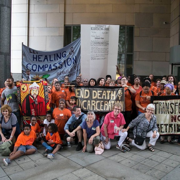 A crowd gathers to support the resentencing of Kempis Songster