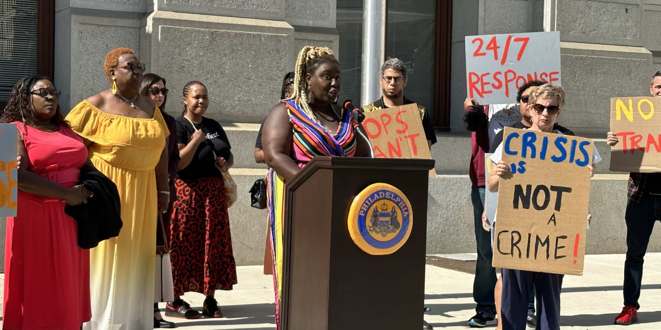 Nikki Grant speaks at a press conference demanding increased funding for mobile crisis response