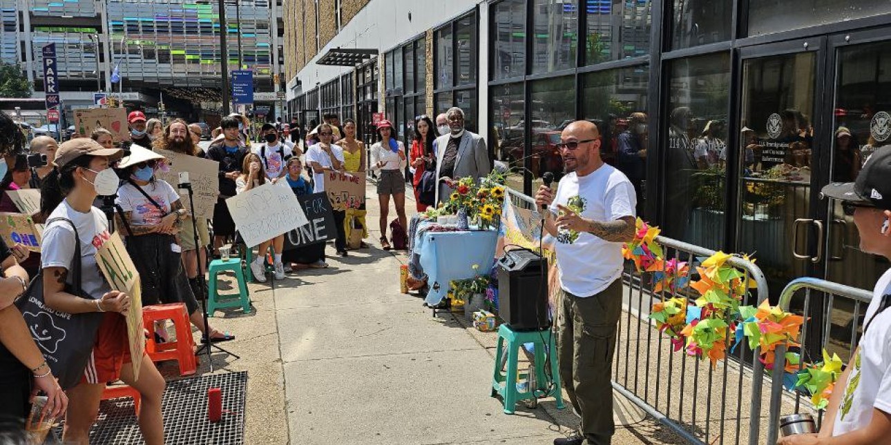 One Van speaks at a rally