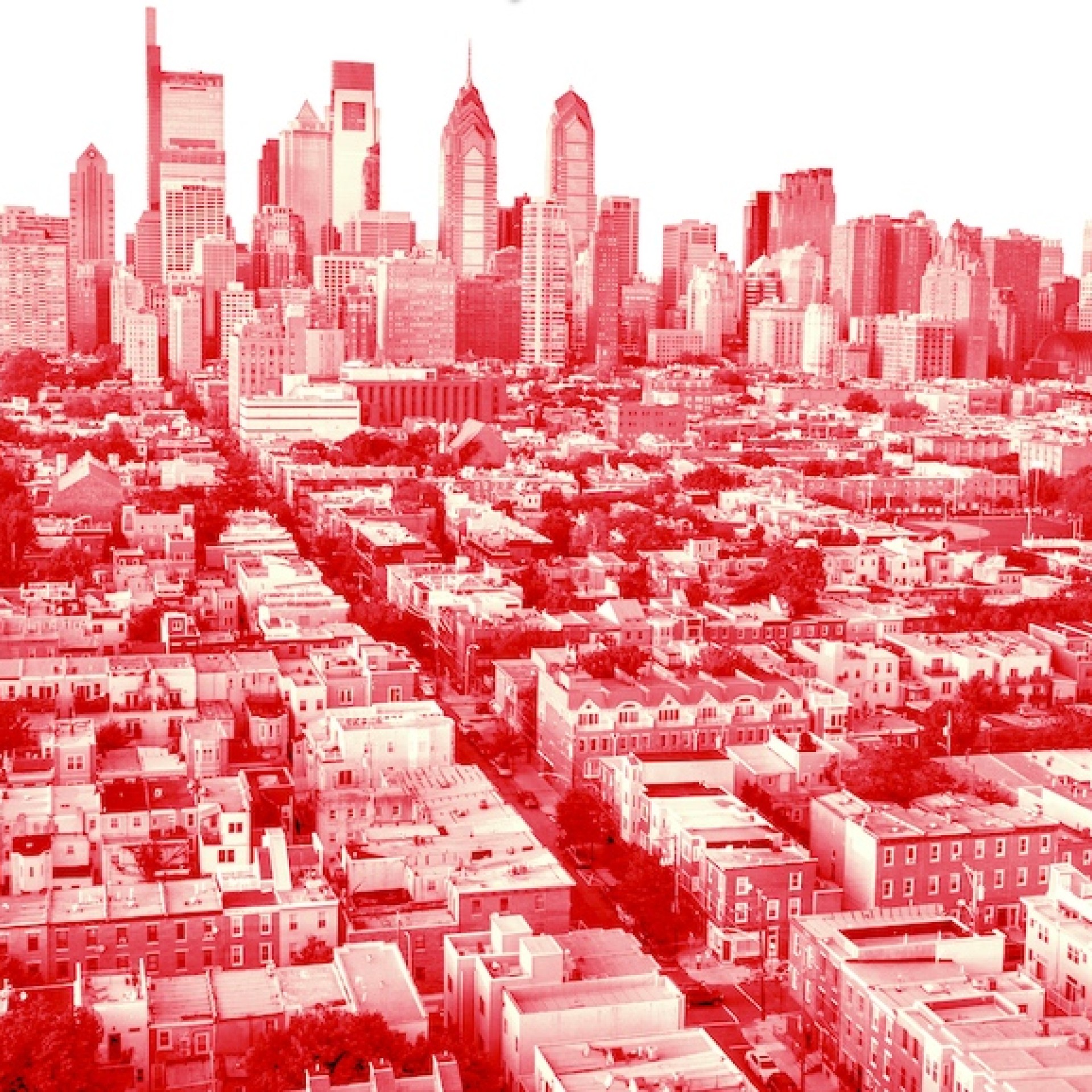 an image shows the Philly city skyline and some of the city from an aerial view in red
