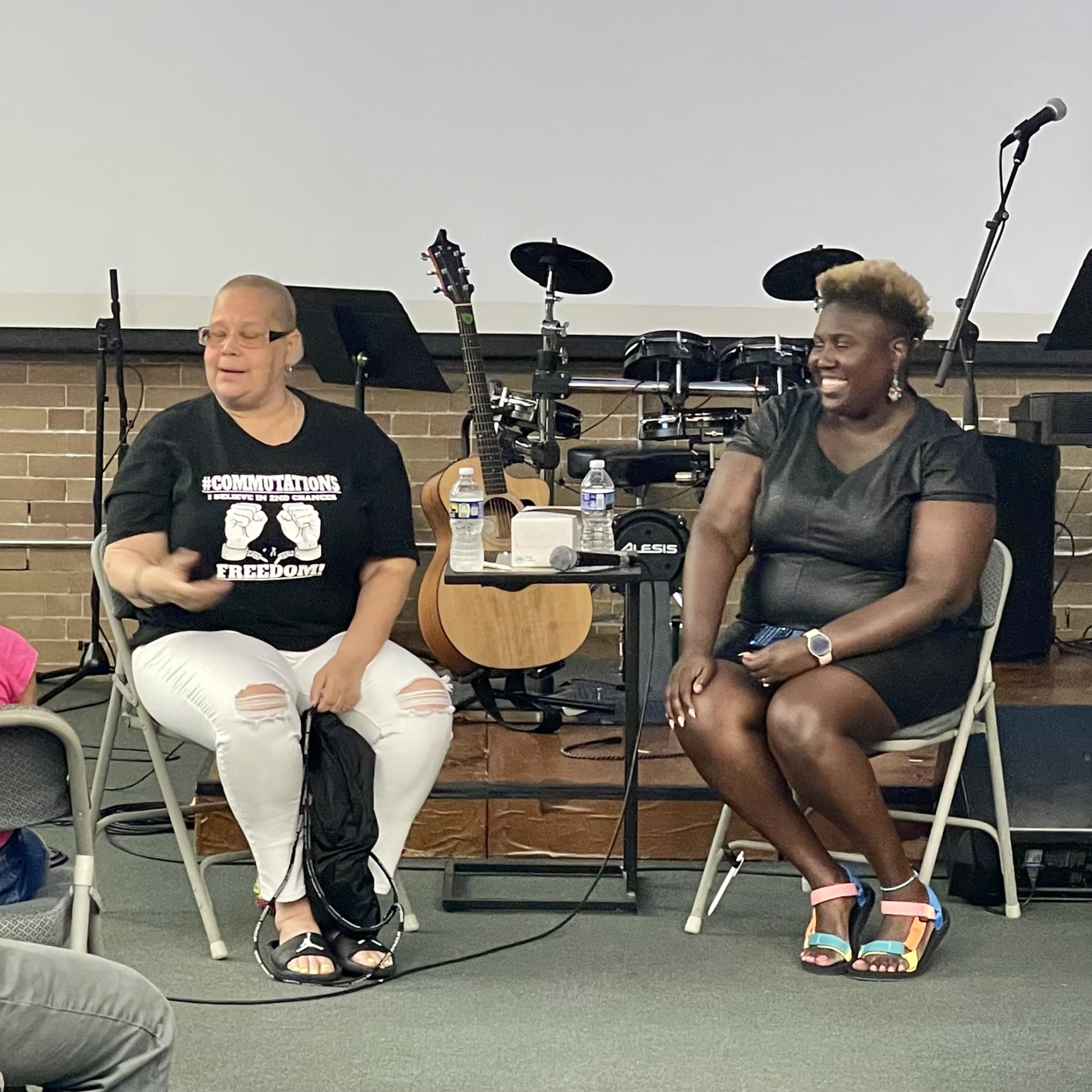 Mrs Dee Dee and Nikki Grant Laugh Together on a panel