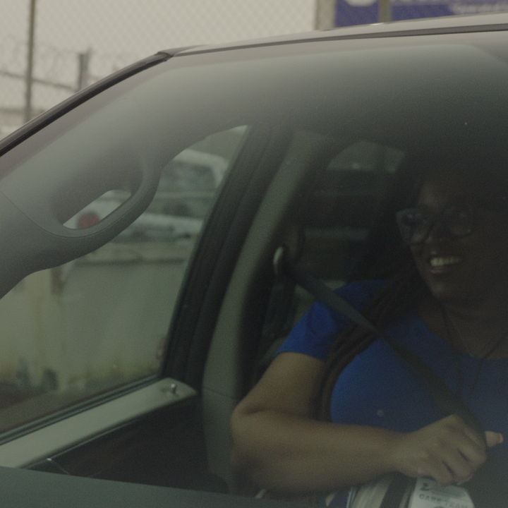 DeShante smiling in passenger seat